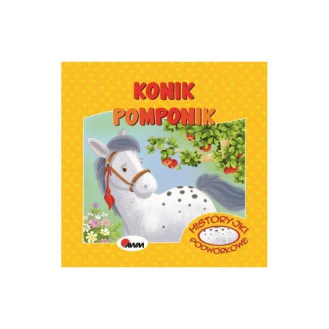 Okładka książeczki „Konik Pomponik” z ilustracją białego konika в kropki pod jabłonią
