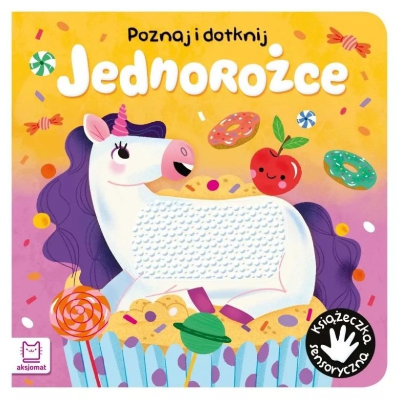 Książeczka sensoryczna „Poznaj i Dotknij – Jednorożce” z ilustracją jednorożca i kolorowych słodyczy.
