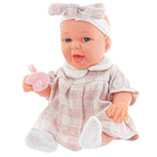 Urocza lalka niemowlę w różowej sukience z kokardą i smoczkiem – zabawka dla dziewczynek